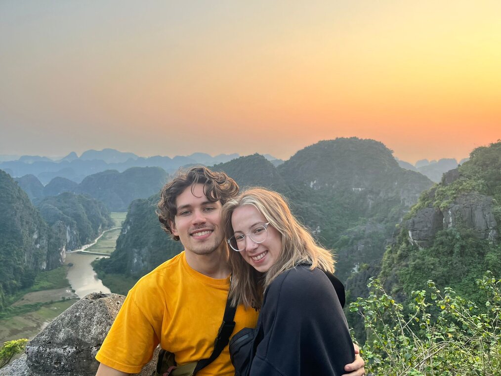 A couple atop a mountain in Ninh Binh, Vietnam